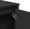 A close-up view of a black cabinet door hinge. Produktbild-Vorschau
