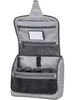 An open grey toiletry bag with multiple compartments and a small mirror inside. Produktbild-Vorschau