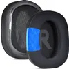 Two black ear pads for headphones are shown, one slightly behind the other. The front ear pad has a blue tape accent and a gray 'R' logo visible. Náhled obrázku produktu