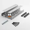 A set of desk cable management accessories, including two metal cable channels, screws, and cable ties, laid out on a white background. Produktbild-Vorschau
