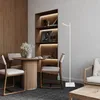 A modern dining area with a round wooden table, chairs, and a bookshelf. Produktbild-Vorschau