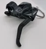 A black bicycle brake lever with a cable attached, set against a plain white background. Anteprima dell’immagine prodotto