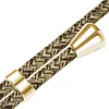 A close-up view of a braided cord with metallic gold-colored accents. Produktbild-Vorschau