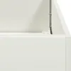 A close-up view of the corner of a white planter box, showing a metal bracket and screws. Voir les images du produit