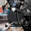 Collage of a black handheld vacuum cleaner being used in various settings: cleaning a car interior, a keyboard, and a vacuum storage bag. Podgląd zdjęcia produktu