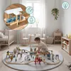 A child playing with a wooden train set on a rug in a nursery or playroom. Podgląd zdjęcia produktu