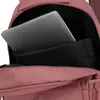 A close-up view inside a rosé-colored backpack, showing a laptop placed in a padded compartment. Anteprima dell’immagine prodotto