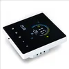 A digital thermostat with a black touchscreen display and white casing, shown at an angle on a white background. Podgląd zdjęcia produktu