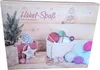 An advent calendar with a Christmas theme, featuring crochet supplies like yarn and hooks, along with decorative elements like a small Christmas tree and presents. Produktbild-Vorschau