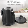 A black electric kettle and its power base are displayed on a table, with text overlaying the background. Produktbild-Vorschau