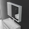 A modern white bathroom vanity with a rectangular sink and faucet, reflected in a white-framed medicine cabinet with integrated lighting. Produktbild-Vorschau