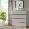 A modern bedroom scene with a dresser, plant, and window. Produktbild-Vorschau