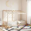 A child's bed with a house-shaped frame in a bedroom setting. Náhled obrázku produktu
