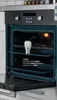 An oven with a light bulb inside, showing the product in use. Produktbild-Vorschau