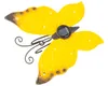 A yellow solar-powered butterfly garden decoration. Podgląd zdjęcia produktu