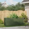 A rectangular planter filled with plants sits on a grassy lawn in front of a wooden fence and a house. Produktbild-Vorschau