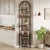 A corner bar shelf unit filled with bottles and glasses, placed in a room with kitchen cabinets and a plant. Náhľad obrázku produktu
