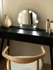 A vanity table with a makeup mirror and a chair. Náhled obrázku produktu