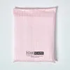 A pink bedding set is folded and presented in its packaging. Náhled obrázku produktu