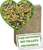 A bag of birdseed with a heart-shaped overlay showing a close-up of the seed mixture. Produktbild-Vorschau