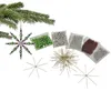 A collection of materials for making wire star ornaments, including beads and wire frames, with a finished ornament hanging from a pine branch. Produktbild-Vorschau