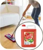 A person is mopping a wooden floor next to a white couch, with a bottle of Ajax liquid cleaner superimposed in a circle. Náhled obrázku produktu