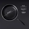 A frying pan with dimensions and weight indicated by text overlays. Voir les images du produit