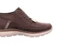 A side view of a brown Skechers slip-on boot. Náhled obrázku produktu