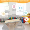 A children's climbing triangle and slide set displayed in a room with other toys and furniture. Anteprima dell’immagine prodotto