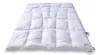A white down comforter is laid out flat on a white background. Produktbild-Vorschau