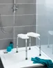 A shower stool is placed in a shower stall. Produktbild-Vorschau