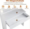 A close-up view of a white vanity table with drawers, highlighting storage features. Voir les images du produit