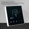 A digital thermostat with a black screen displaying temperature and time, set against a light gray background. Podgląd zdjęcia produktu