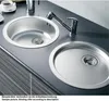 Two stainless steel sinks on a countertop, one with a faucet. Produktbild-Vorschau