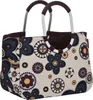 A studio shot of a shopping bag with a floral pattern. Podgląd zdjęcia produktu