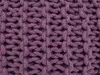 A close-up view of a knitted pouf. Náhled obrázku produktu