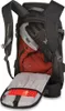 A black Dakine backpack with its main compartment open, showing a red jacket, gray beanie, and black gloves inside. The front flap is open, revealing a red shovel blade and gray lining. Anteprima dell’immagine prodotto