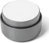 A close-up studio shot of a gray furniture foot with a white top. Produktbild-Vorschau