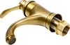 A close-up studio shot of a brass-colored faucet. Podgląd zdjęcia produktu