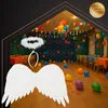 A party room decorated with balloons and streamers, with angel wings and a halo in the foreground. Produktbild-Vorschau
