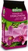 A bag of orchid substrate with images of orchids on it. Produktbild-Vorschau