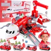 A toy airplane playset with fire trucks and accessories, with a child wearing a firefighter helmet in the foreground. Produktbild-Vorschau
