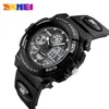 A close-up, angled shot of a black digital sports watch. Produktbild-Vorschau