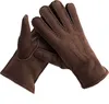 A pair of brown leather gloves on a white background. Produktbild-Vorschau