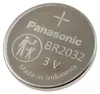 A close-up, top-down view of a single silver coin-cell battery. Produktbild-Vorschau