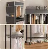 A collage of images showing different views and details of a portable wardrobe. Voir les images du produit
