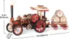 A 3D wooden model of a steam engine with a trailer carrying barrels. Voir les images du produit