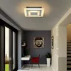 A modern hallway with a desk, chair, and artwork. Produktbild-Vorschau