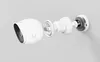 An exploded view of a white security camera and its mounting hardware against a light gray background. Produktbild-Vorschau