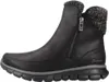 A side view of a black Skechers winter boot with a knitted cuff and a zipper. Voir les images du produit